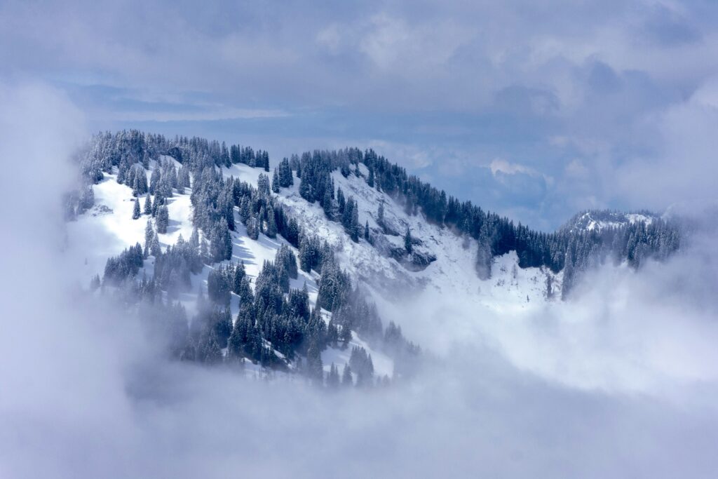 Winter snow high up, calm down low